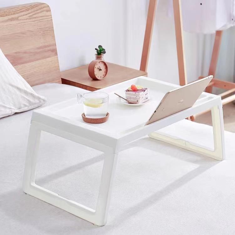 Compact Foldable Bed Table: Portable and Versatile Desk for Home, Dorm, or Dining Use.