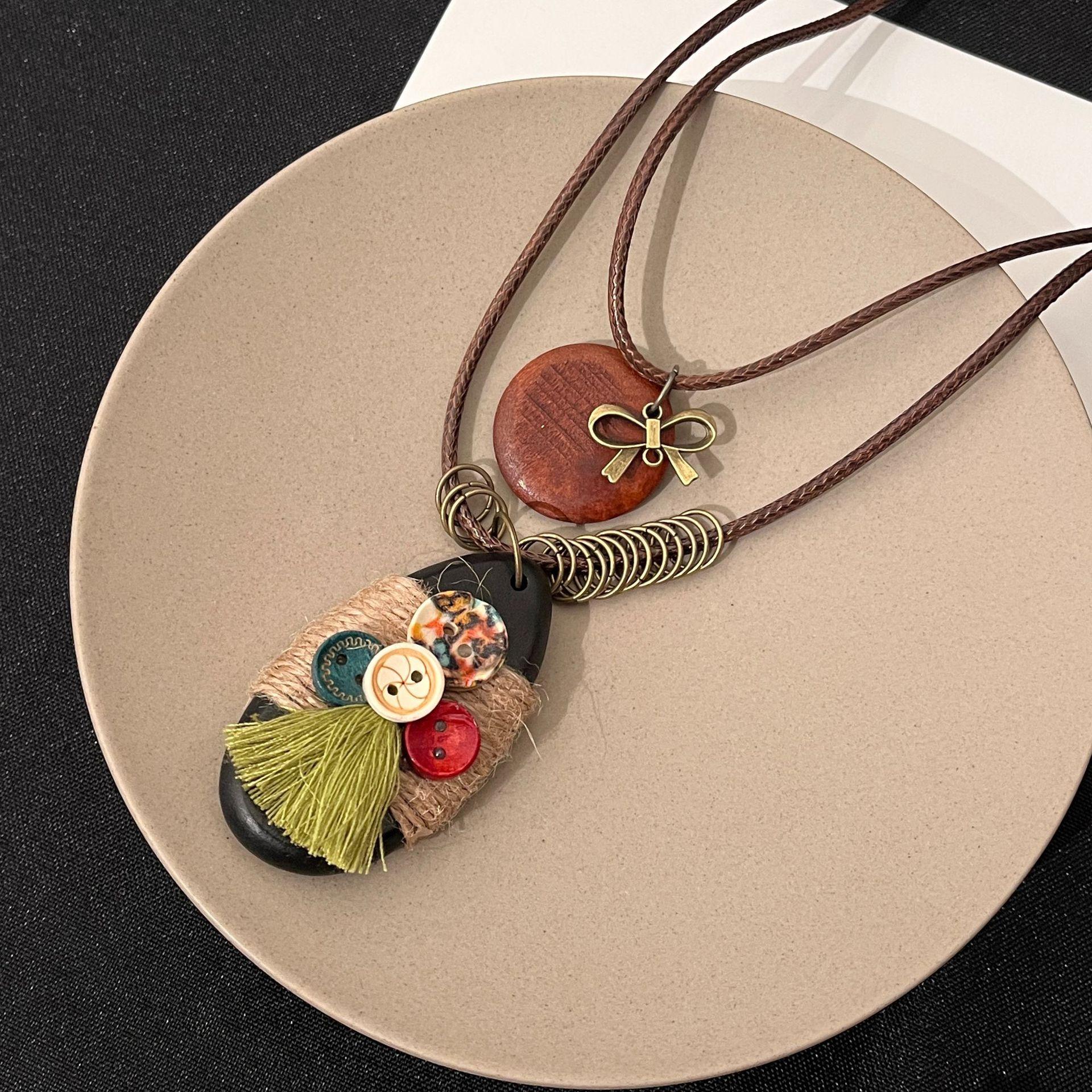 Ретро-этническое ожерелье, Нишевый креативный кулон-пуговица в форме капли воды, Высококлассное классическое антикварное ожерелье.