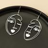 Niche Abstract Hollow Face Earrings - European/American Street Style