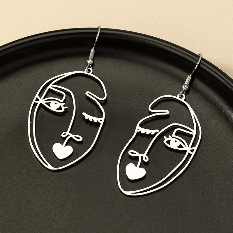 

Niche Abstract Hollow Face Earrings - European/American Street Style