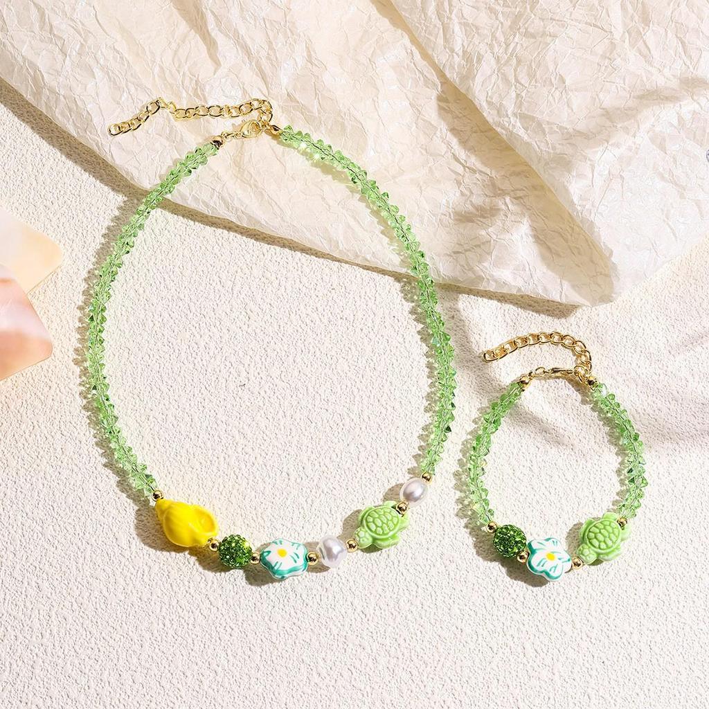 Seaside Elegance: Starfish & Shell Bead Bracelet with Oceanic Flair