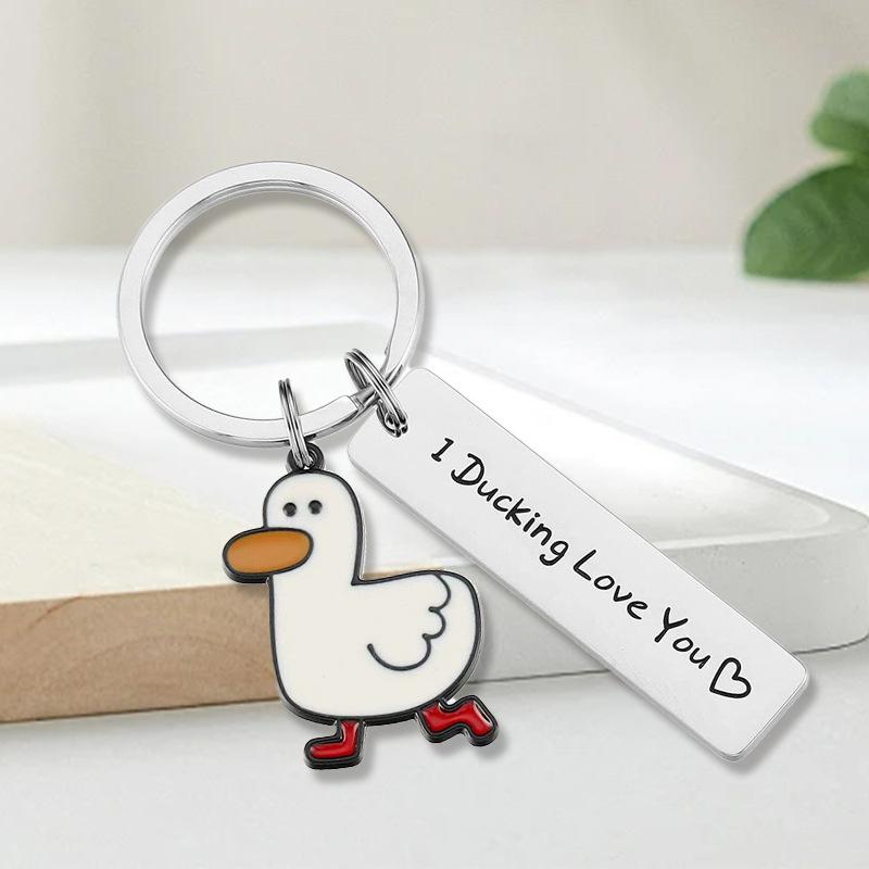 

1PC Stainless Steel Keychain Creative Backpack Charm Student Pet Duck Cartoon Duckling Keychain Cute