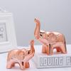 Elegant Ceramic Elephant Figurine As A Decorative Accent For Home And Office Spaces