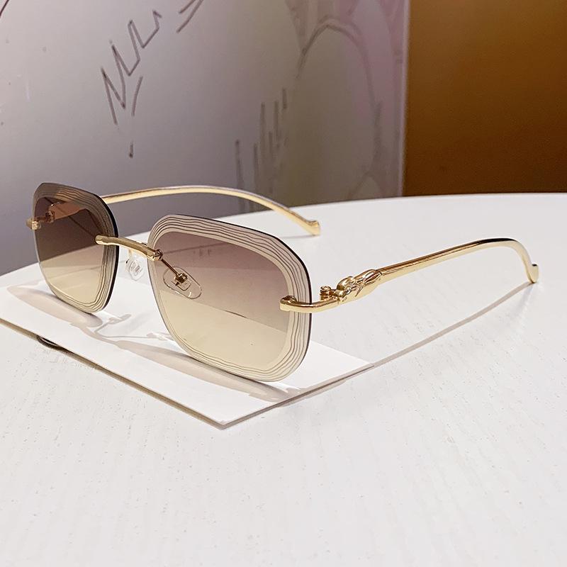 

Unisex Frameless Metal Luxury Sunglasses