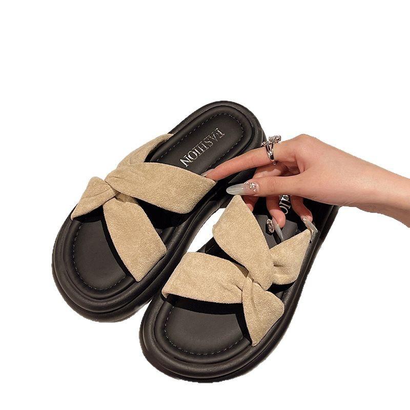 Thick-soled cool slippers for women's summer wear 2025 new cross-band fashion word casual seaside beach shoes