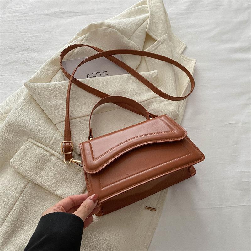 Foreign style simple solid color handbag 2025 early spring new versatile ins shoulder messenger bag small square bag women