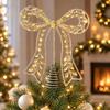 Indoor Festive Window Ornament Iron Bow Christmas Tree Topper, Gold Rhinestone Hollow-Cut Metal Light Luxury Holiday Party Decor with Spiral