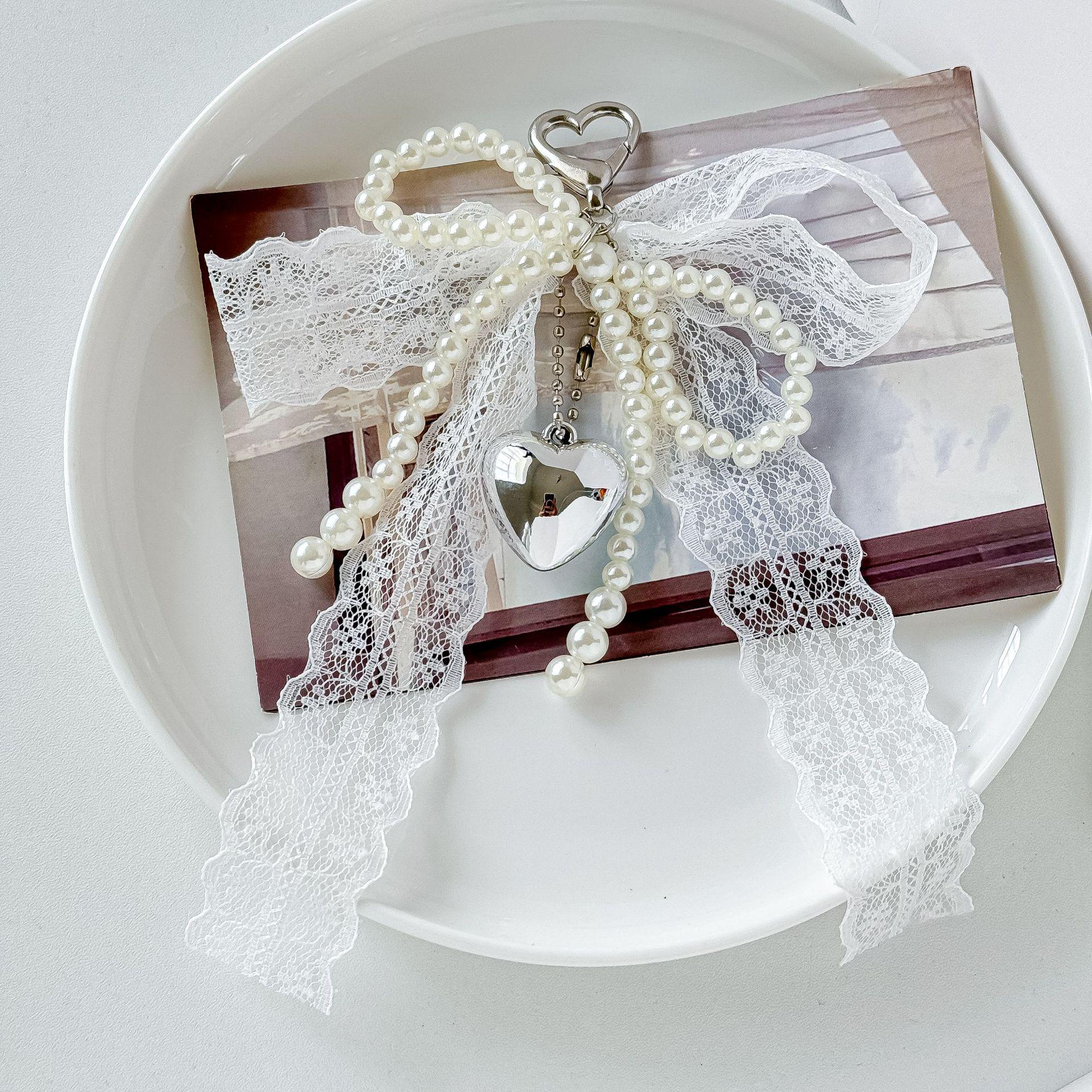 

Korean Lace Bow Bag Charm with Beaded Pearl Heart Keychain