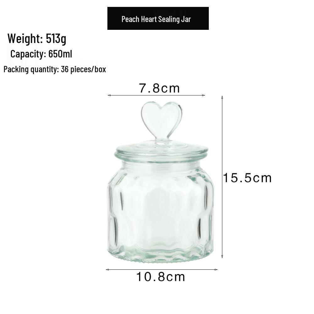 

Прозора скляна банка для зберігання на кухні круп, сушеної мандаринової цедри, маринованих овочів та сухофруктів