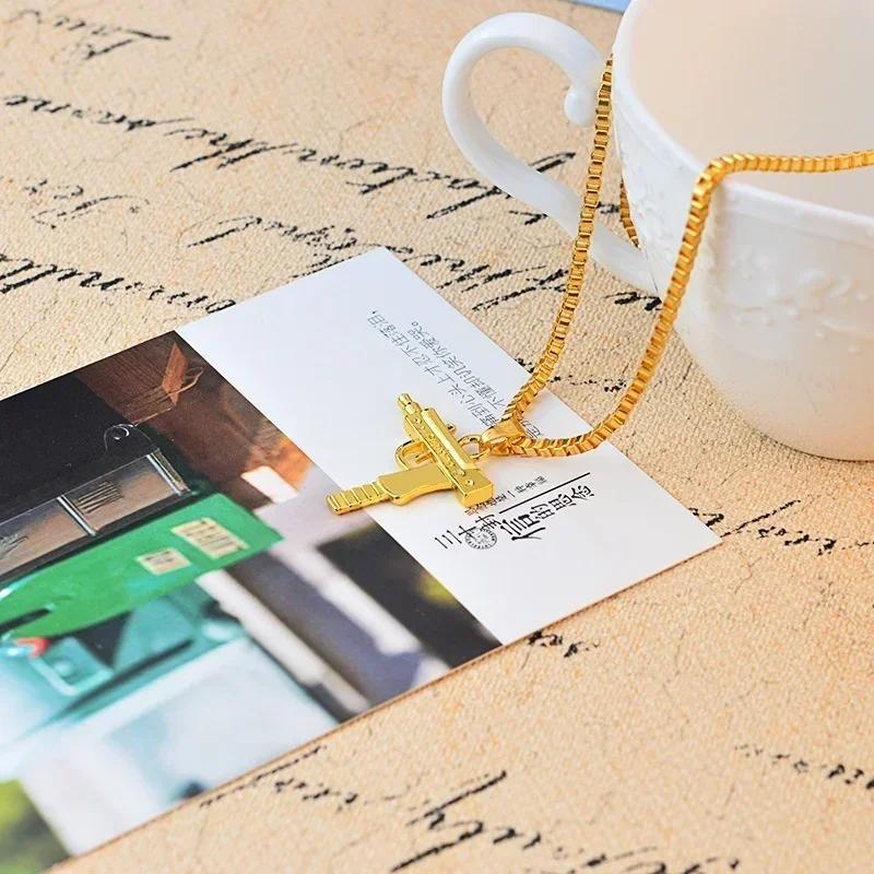 Unisex Herren Gold Maschinengewehr Anhänger Halskette Lange Kette Modeschmuck Halskette Großhandel Herren Halskette