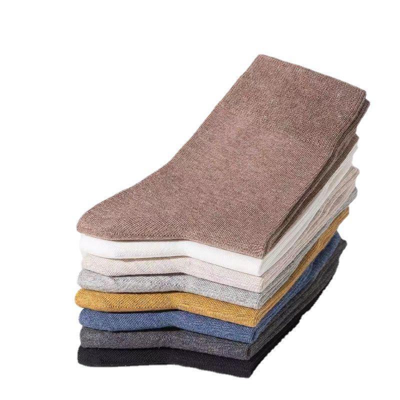 Men's Versatile Black Mid-Tube Socks - Solid Color, Deodorant, Sweat-Absorbent, Ideal for Spring, Autumn, and Summer.