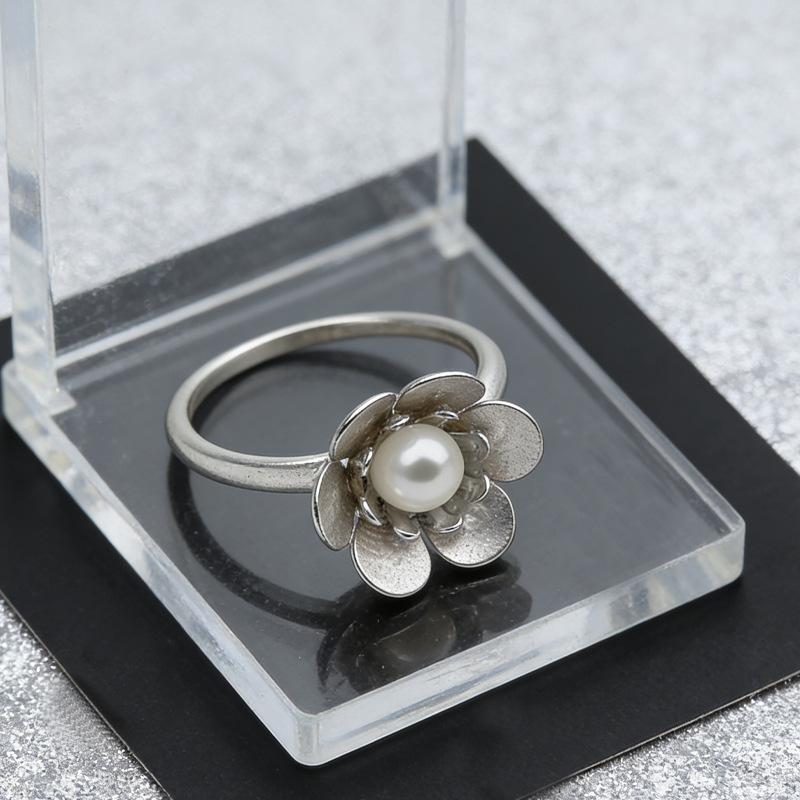 

Finger ring pearl retro temperament sunflower niche design ring ring
