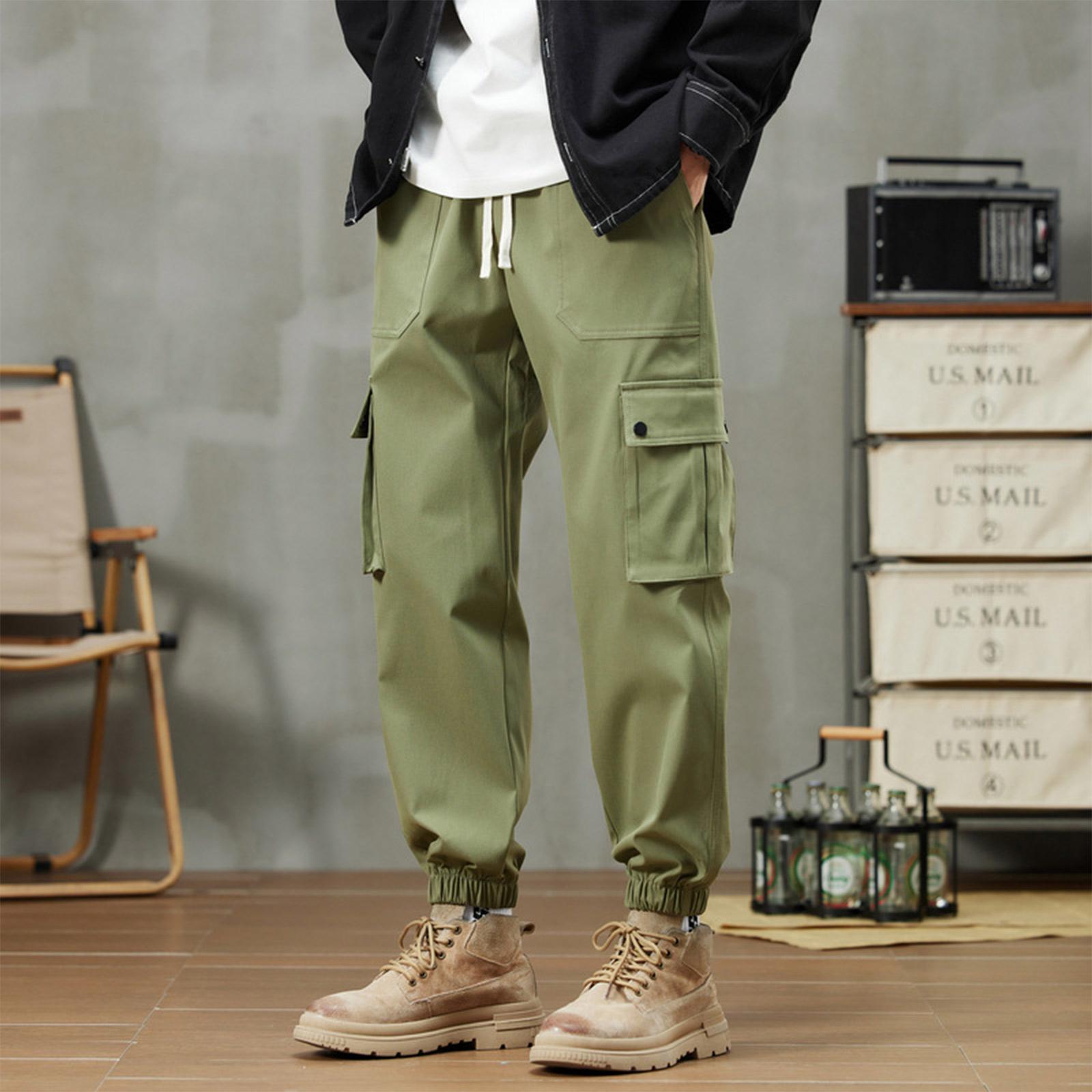 

Men s Solid Color Overalls Loose Fitting Drawstring Pants Trendy Multi Pocket Casual Pants XXXL