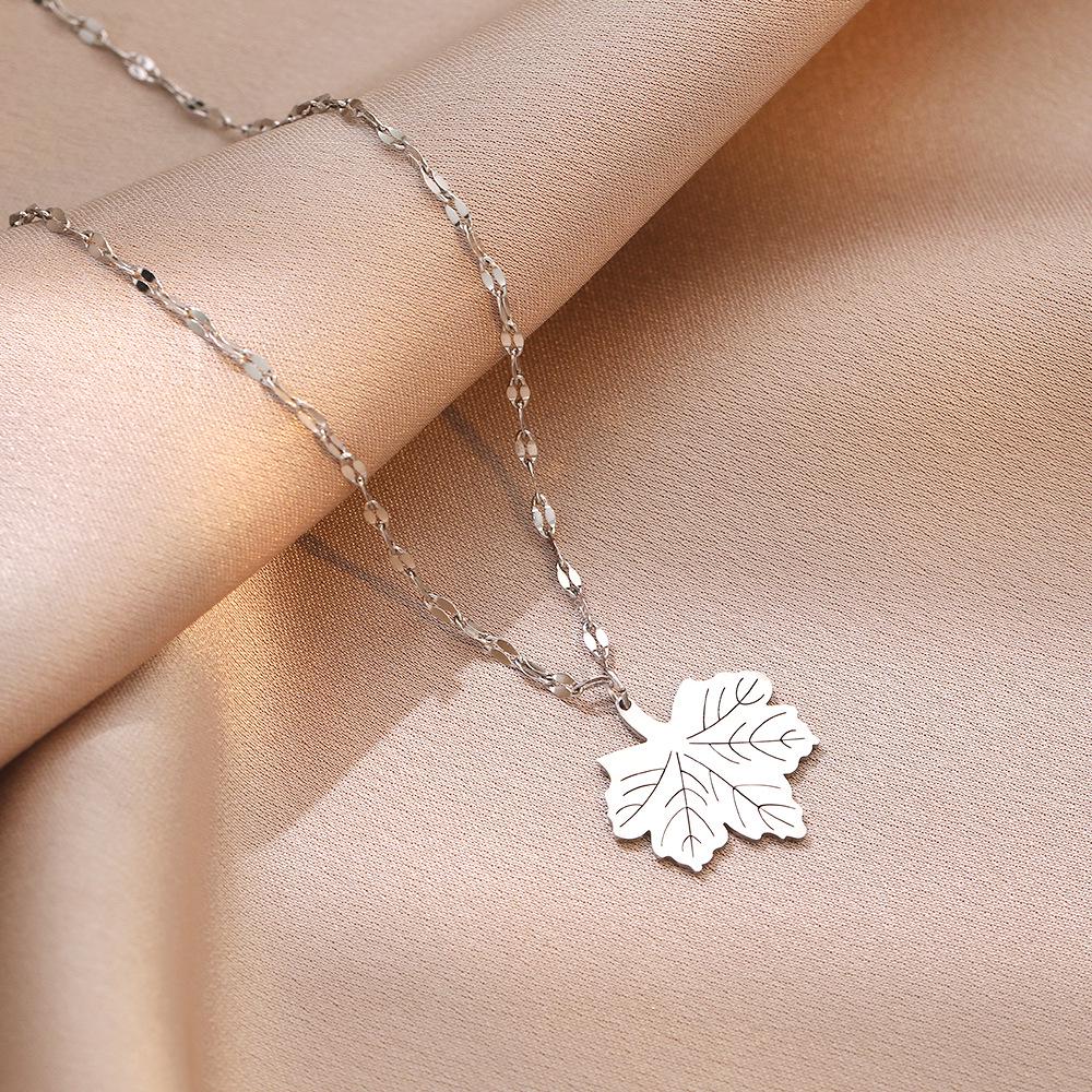 

Японское и корейское ожерелье с подвеской в виде листа для женщин - нержавеющая сталь, модный дизайн, титан