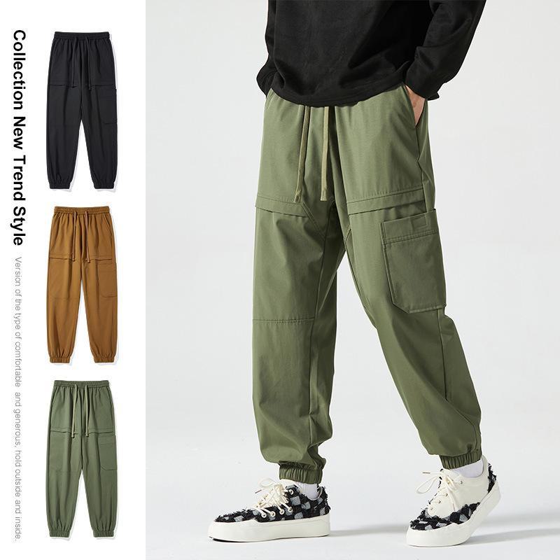 Men's American-Style Autumn Overalls: Fashionable, Casual, Versatile Nine-Point Pants with Loose Cuffs and Multi-Pocket Design.