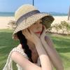 Sweet bow embroidered straw hat women's seaside vacation fisherman's hat children's summer hollow breathable straw visor