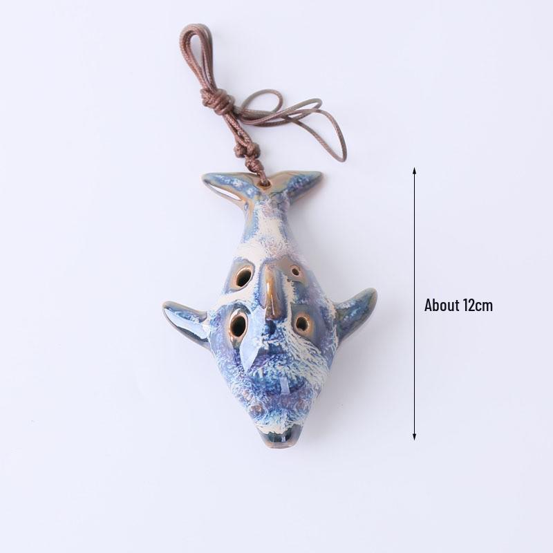 

Kiln-Fired Ceramic Dolphin Cartoon Six-Hole Ocarina with Lanyard – Popular Scenic Spot Toy Handicraft