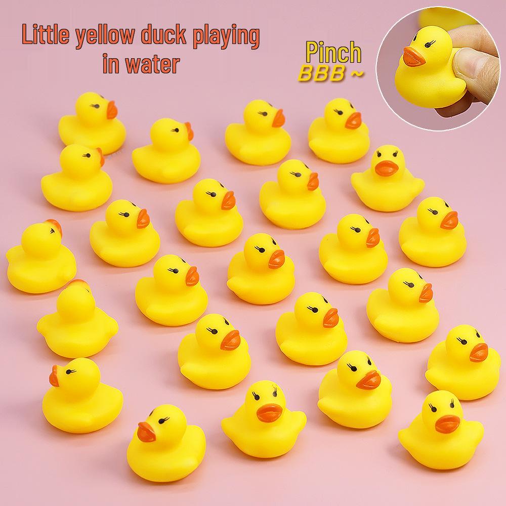 Squeaky Bath Toys: Yellow Rubber Ducklings.