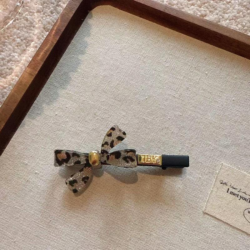 

Премиальный зажим-краб с бантом с леопардовым принтом, темпераментный, модный, акриловый цвет, боковой зажим, заколка для волос, зажим-уточка, резинка для волос