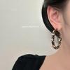 Boucles d'oreilles créoles exquises en cuir à imprimé léopard pour femmes - Mode élégante, luxueuse et polyvalente.