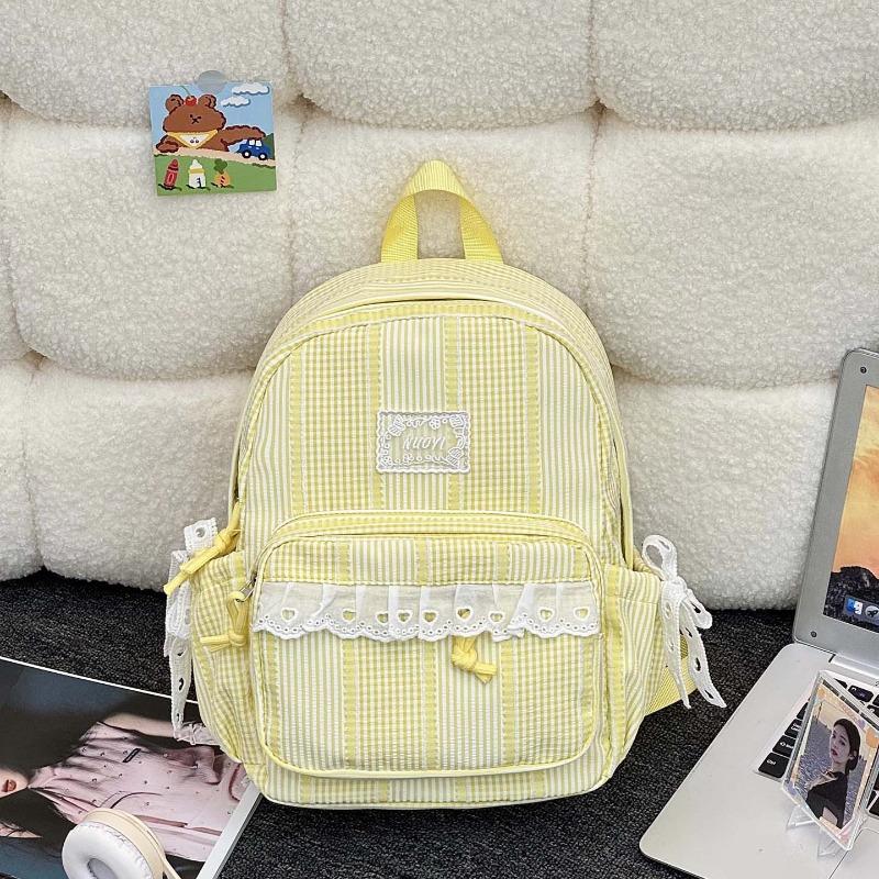 Simple casual striped schoolbag Female junior high school student backpack Large capacity class commuter travel backpack