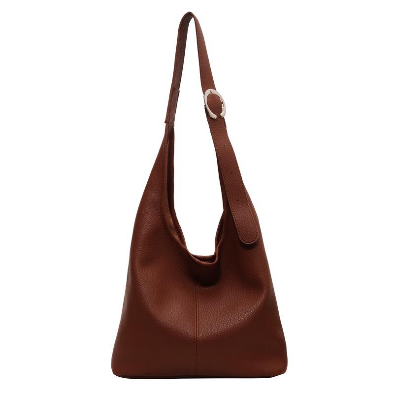 

Large capacity bag women s autumn 2025 new fashion shoulder bag premium texture letter bucket commuter tote bag кавовий