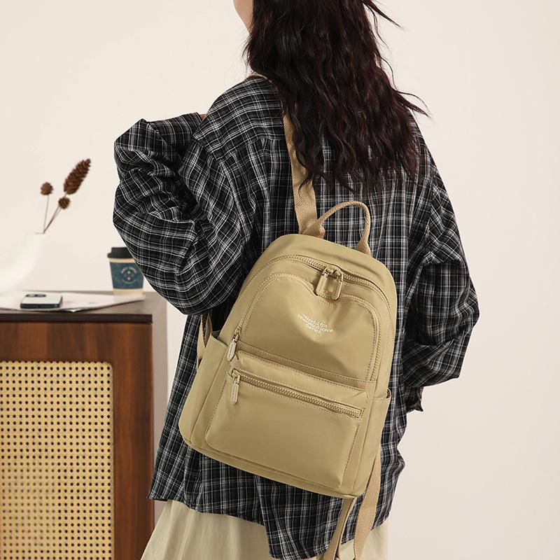 Compact Backpack with Front Zip Pocket Casual Shouler Bag for Daily Use