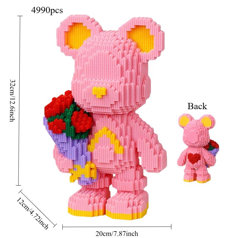 Blockbär hält Blumenstrauß Kreatives Ornament Rosa und Weiße Junge Bären Bausteine Spielzeug Kindergeburtstagsgeschenk Jubiläum Romantisches Geschenk