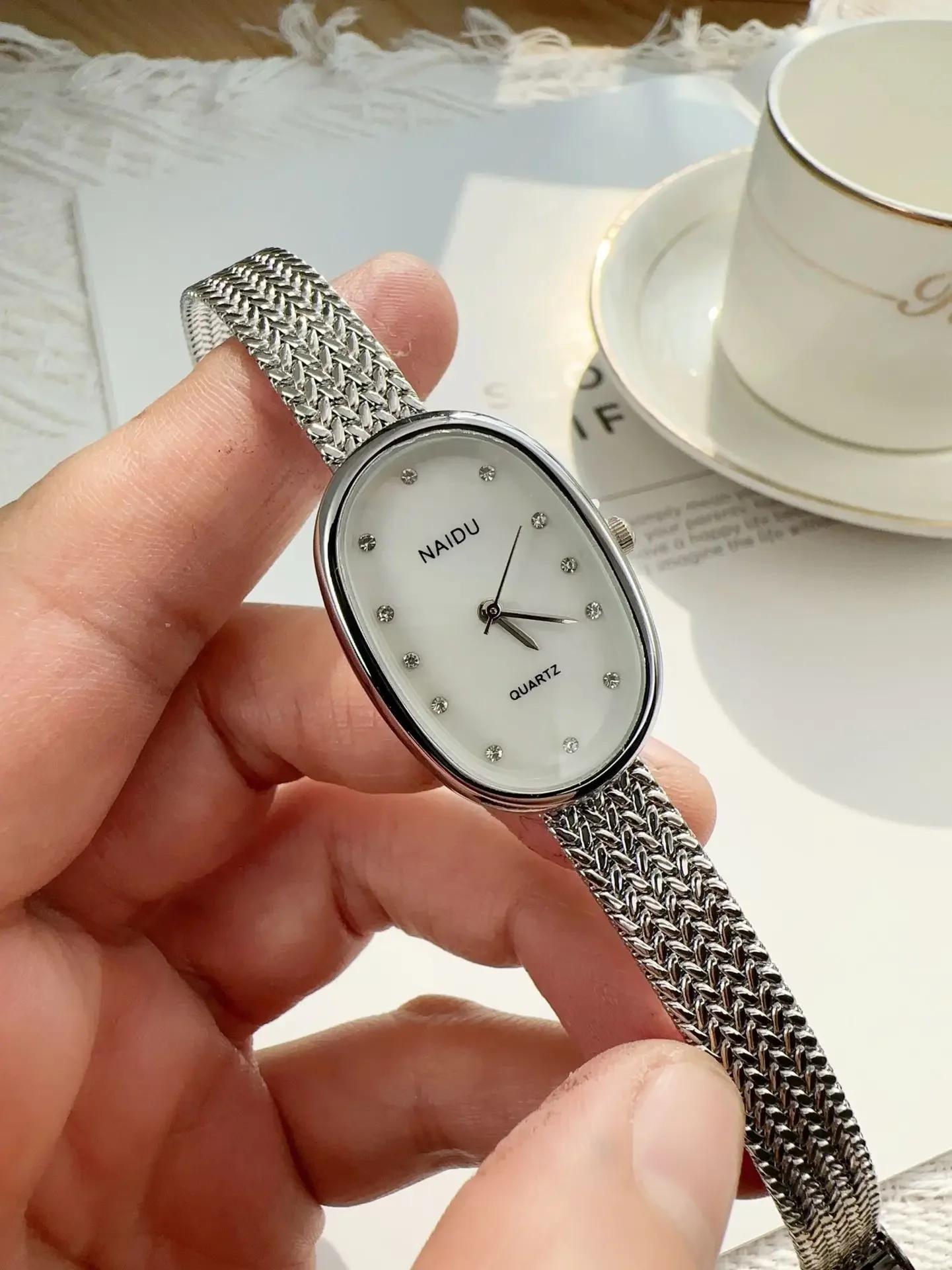 

Роскошные часы с овальным циферблатом и стразами, часы нового бренда, кварцевые часы для женщин, регулируемый ремешок из нержавеющей стали, наручные часы, подарок