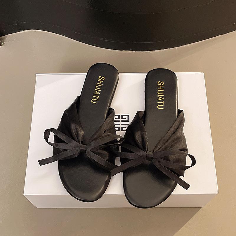 Korean version of fairy style elegant cool slippers 2025 new wear soft-soled bow shoes flat beach open toe cool