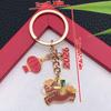 2025 New Year Red Enamel 'Safe and Happy' Persimmon Keychain – Blessing Ornament for Prosperity