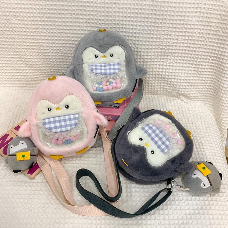 

Japanese and Korean girl messenger bag ins new plush little penguin mobile phone bag cute cartoon girl heart hair bag Bag [without pendant]