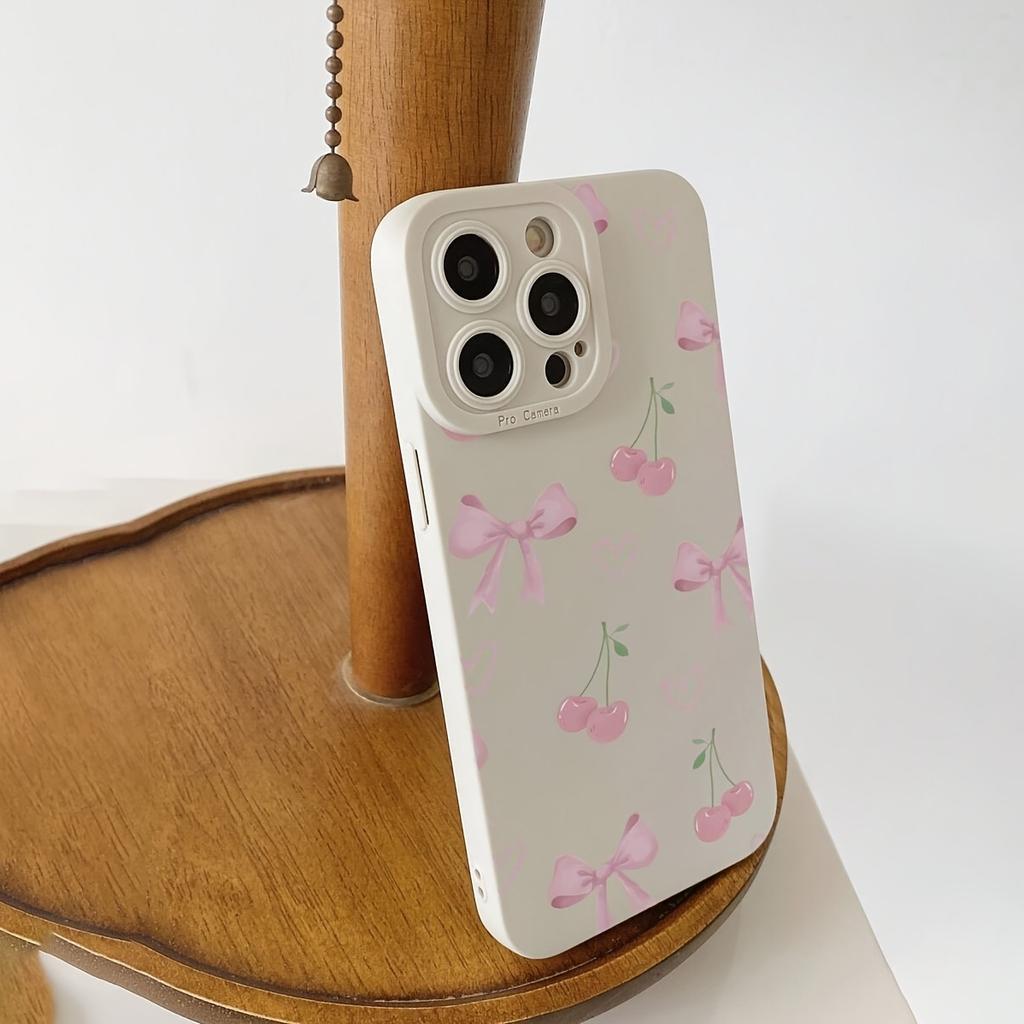 An Ivory White Phone Case with a Bow, Heart, and Cherry Design, Suitable for iPhone 17, 16, 15, Plus, Pro, Max Series Phones - Ideal for Gifting