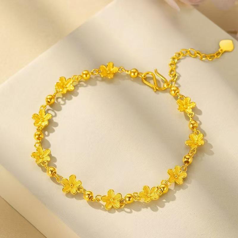 

Браслет из позолоченных бусин-разделителей в виде цветков персика для девушки