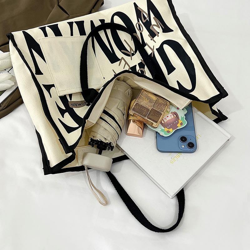 Neue Pendler-Tragetasche Cartoon bemalt Canvas-Tasche große Kapazität Schulter Achseltasche Trend