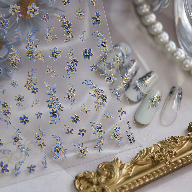 

National Style Golden Edge Blue and White Porcelain Nail Sticker Relief 3D New Arrival 5D Stereo Retro Florals Nail Sticker Decorations Gold-painted blue and white porcelain 5184 (metal)