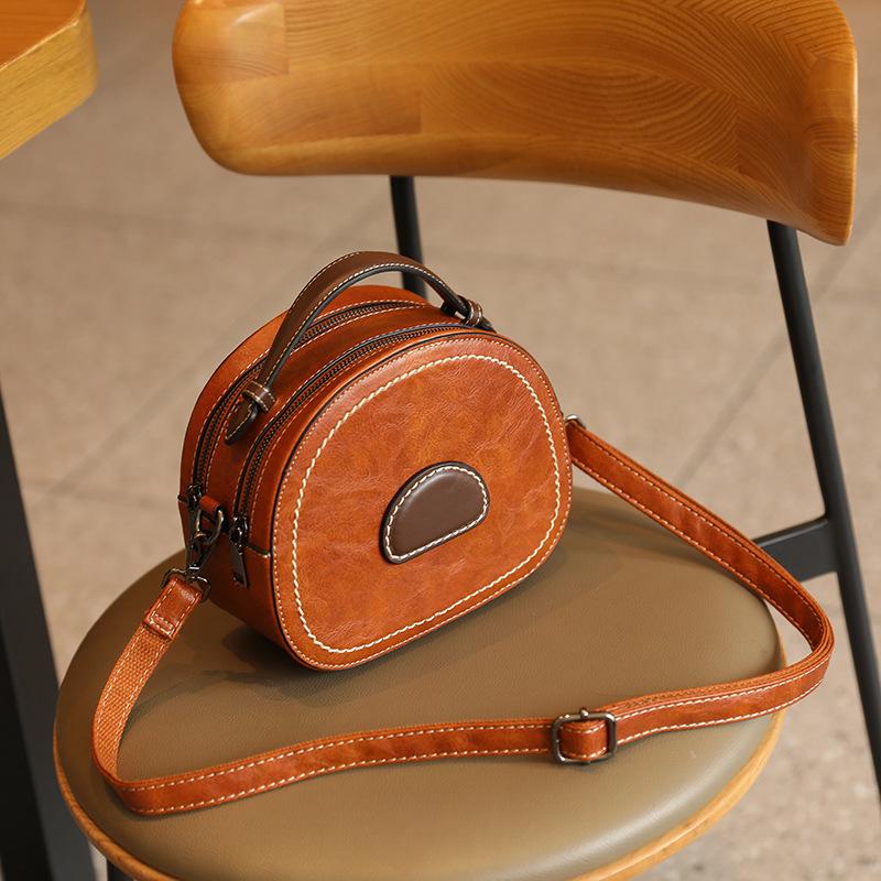 New Small Round Bag with Large Capacity  High End and Fashionable Women's Hand Held Crossbody Bag