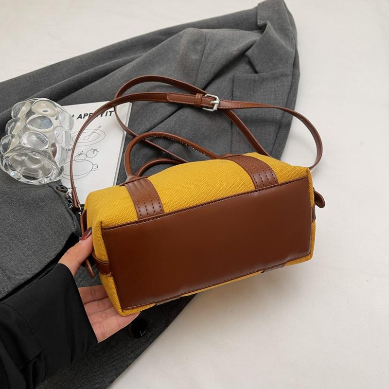Classic Canvas Duffel Bag with Leather Trim and Adjustable Strap Perfect for Travel and Everyday Use