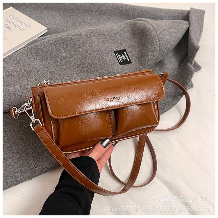 

Fashion temperament, armpit bag, small bag, women s 2025 winter new commuter shoulder messenger bag, large-capacity baguette bag коричневий
