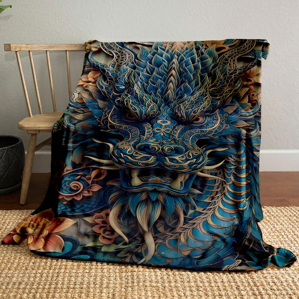 Intricate blue dragon design with detailed scales, flowers, and patterns. for all seasons blanket lunch break throw gift