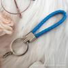 Gevlochten Lederen Touw Sleutelhanger met Poppenhanger - Modieus en Creatief Accessoire