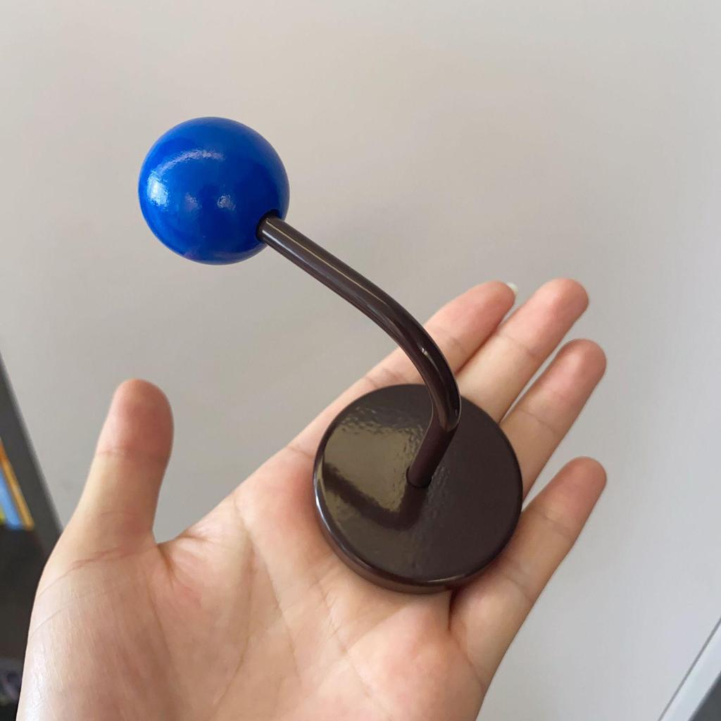 Vibrant Magnetic Adhesive Hook - No-Drill, Strong, Traceless Design for Kitchen, Bathroom, Door, or Refrigerator.
