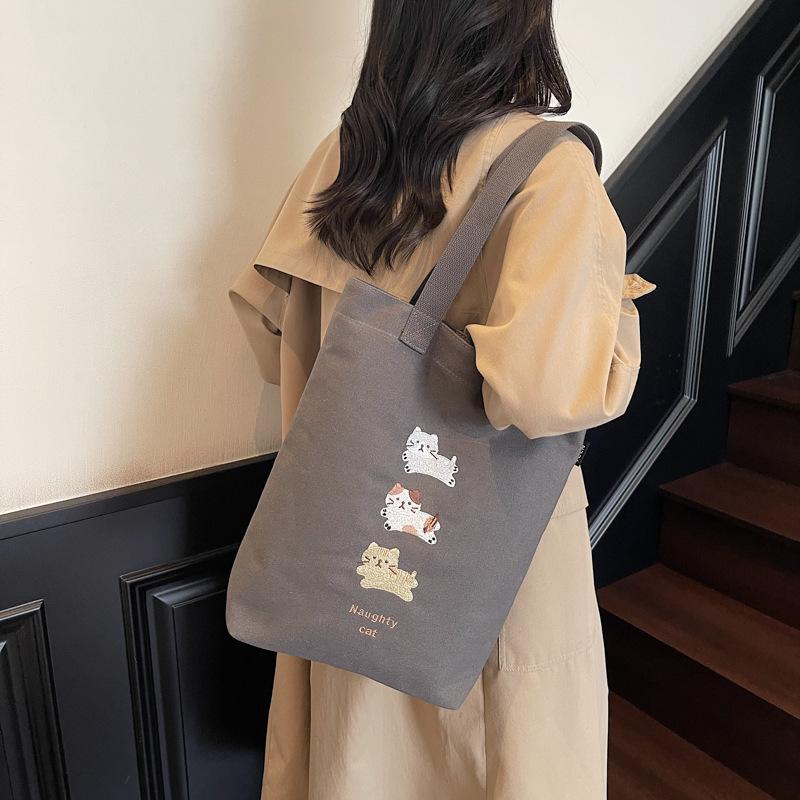 2025 summer new tote bag commute to work large capacity cartoon solid color trend niche foreign shoulder bag