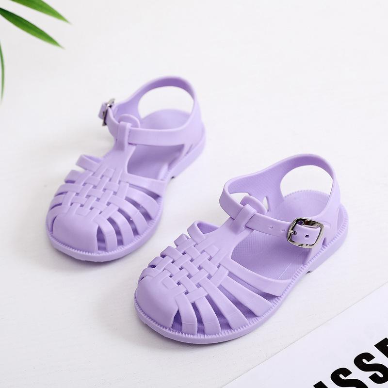 Children's sandals spring and summer boys soft-soled hollowed-out hole shoes girls flat-soled bag head jelly shoes baby children's sandals