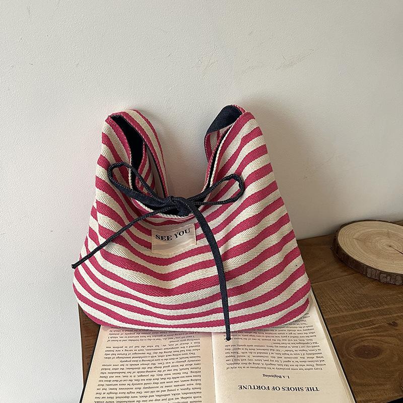 Casual large-capacity striped bag women's new summer commuter versatile messenger bag shoulder tote bag