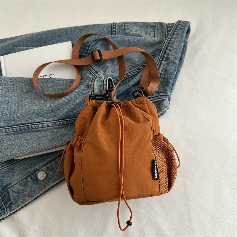 Waterproof Nylon Drawstring Bucket Bag for Women 2026 Trendy Minimalist Shoulder Crossbody Purse