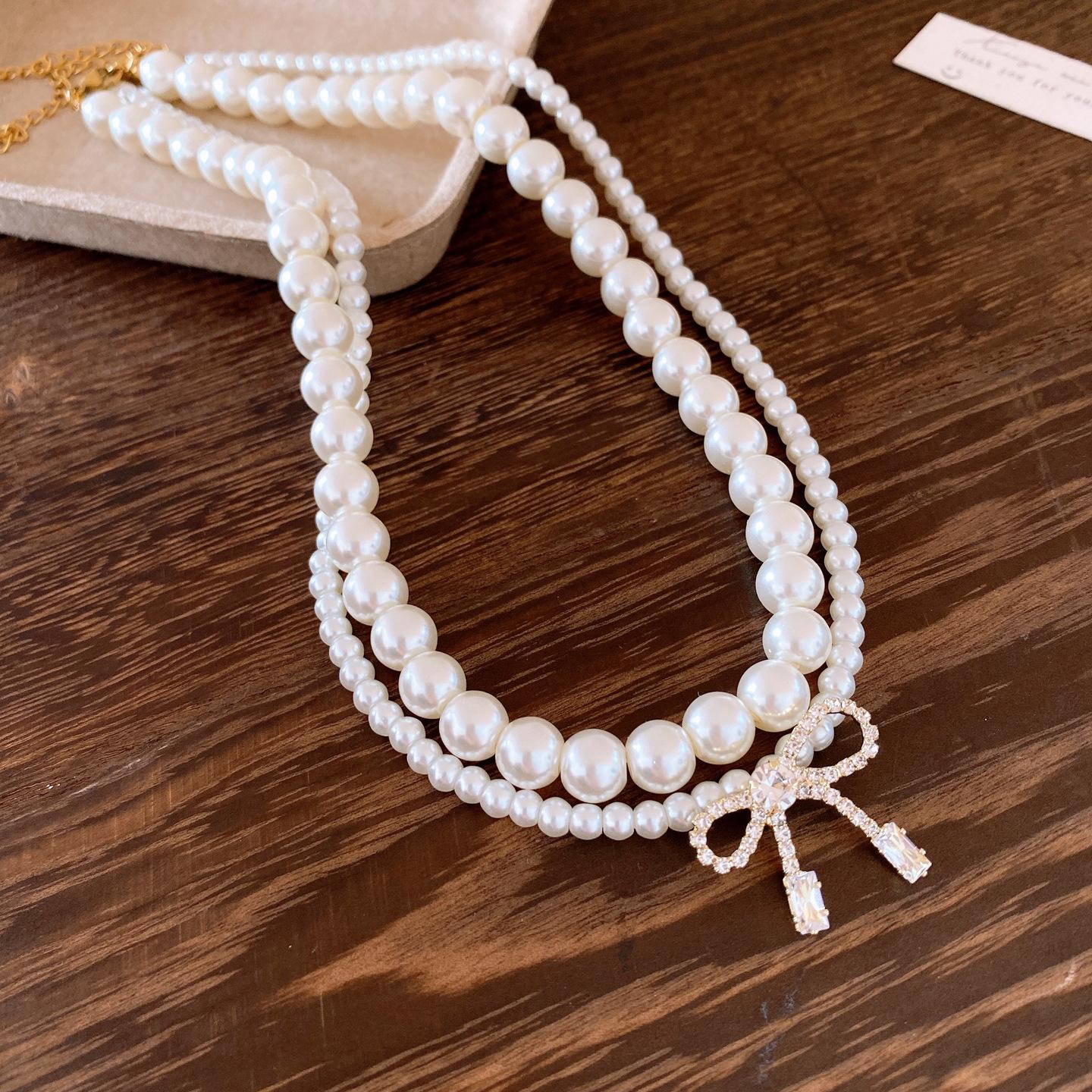 

French temperament beaded zircon bow pearl necklace collarbone chain elegant niche necklace women