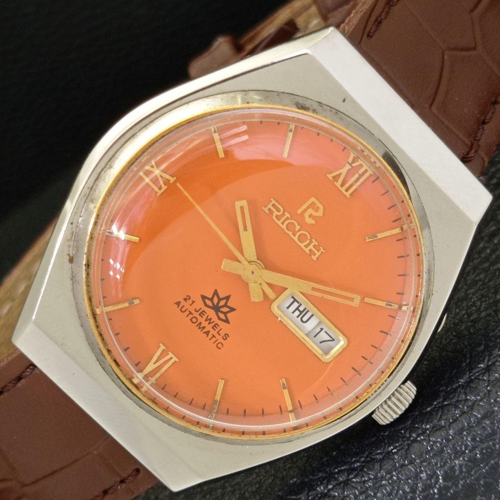 

ВИНТАЖНЫЕ АВТОМАТИЧЕСКИЕ ЧАСЫ RICOH R31 ЯПОНИЯ МУЖСКИЕ ОРАНЖЕВЫЙ ЦИФЕРБЛАТ a500624-5 R153-a500624