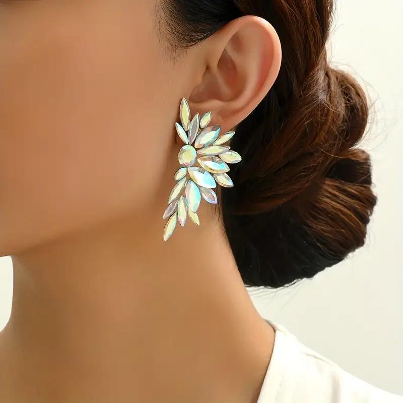 New fashionable stud earrings for women, horse eye geometric high luxury jewelry, feather wings dopamine earrings.
