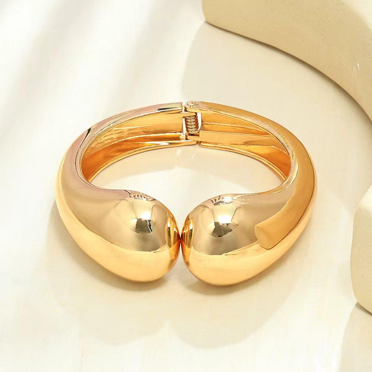 Ювелирные изделия Преувеличенный Симметричный Двухголовый Золотой Браслет Тяжелая Промышленность Металлический Блестящий Браслет Ювелирные изделия